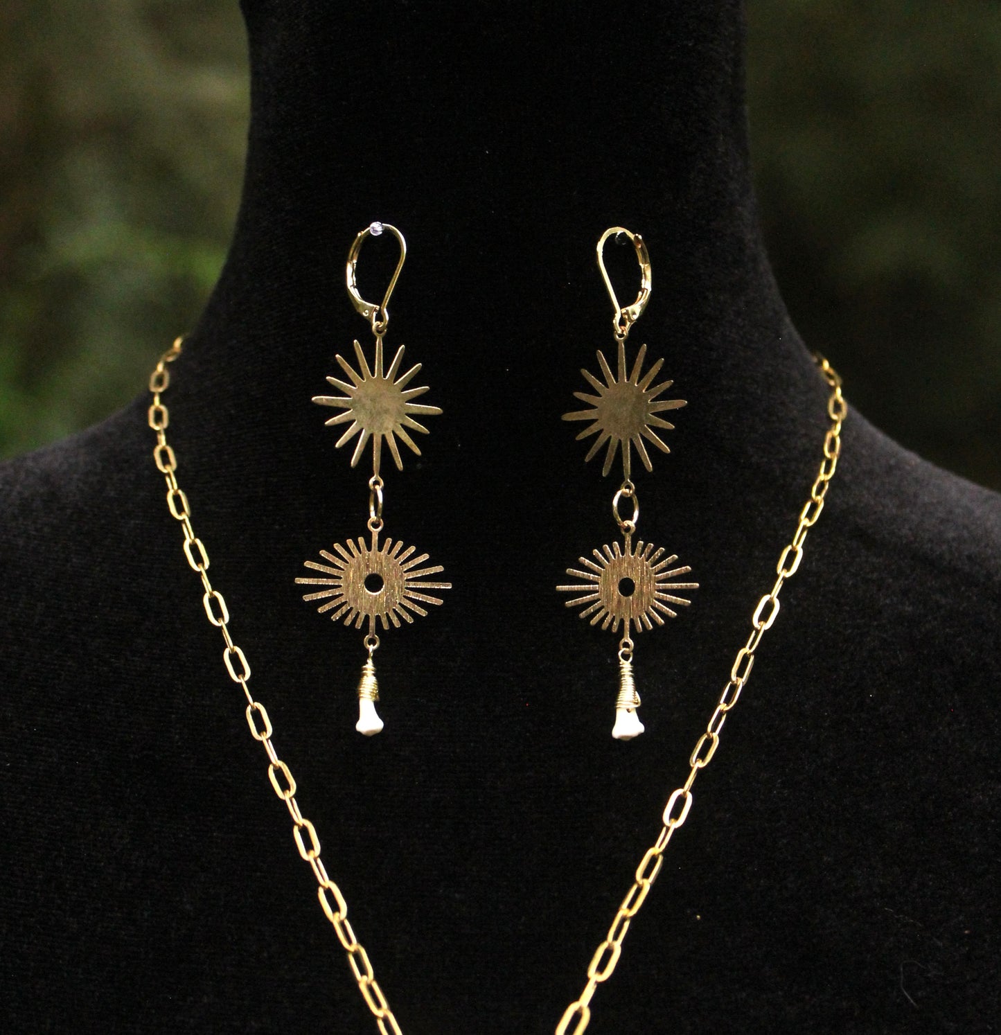 Sunburst Eye Raccoon Teeth Earrings