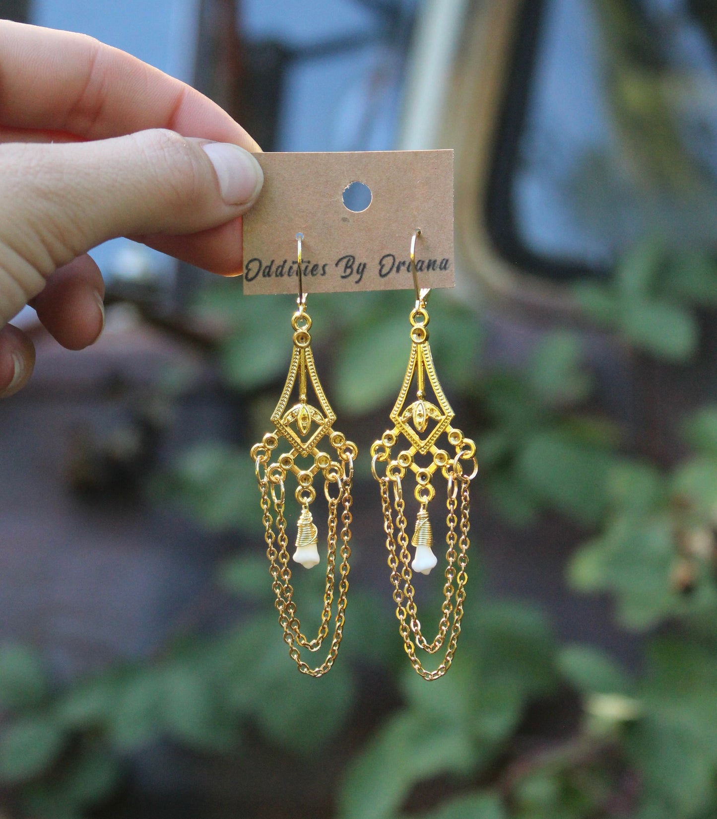 Raccoon Incisor Chandelier Earrings