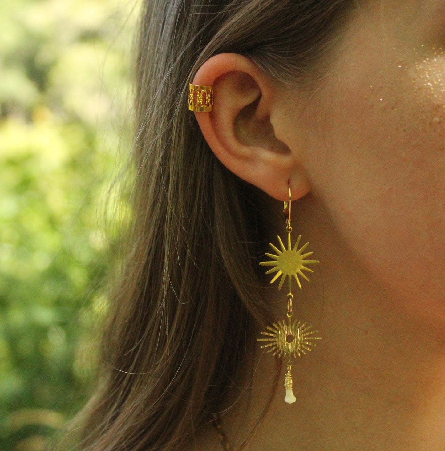 Sunburst Eye Raccoon Teeth Earrings
